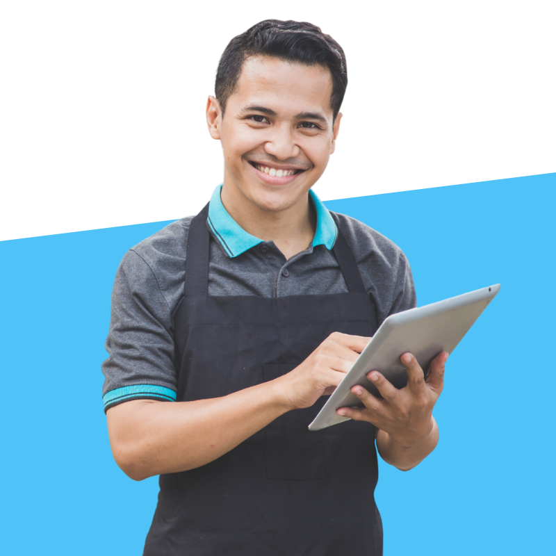 Convenience Store Owner holding tablet smiling Convenience Store Owner holding tablet smiling