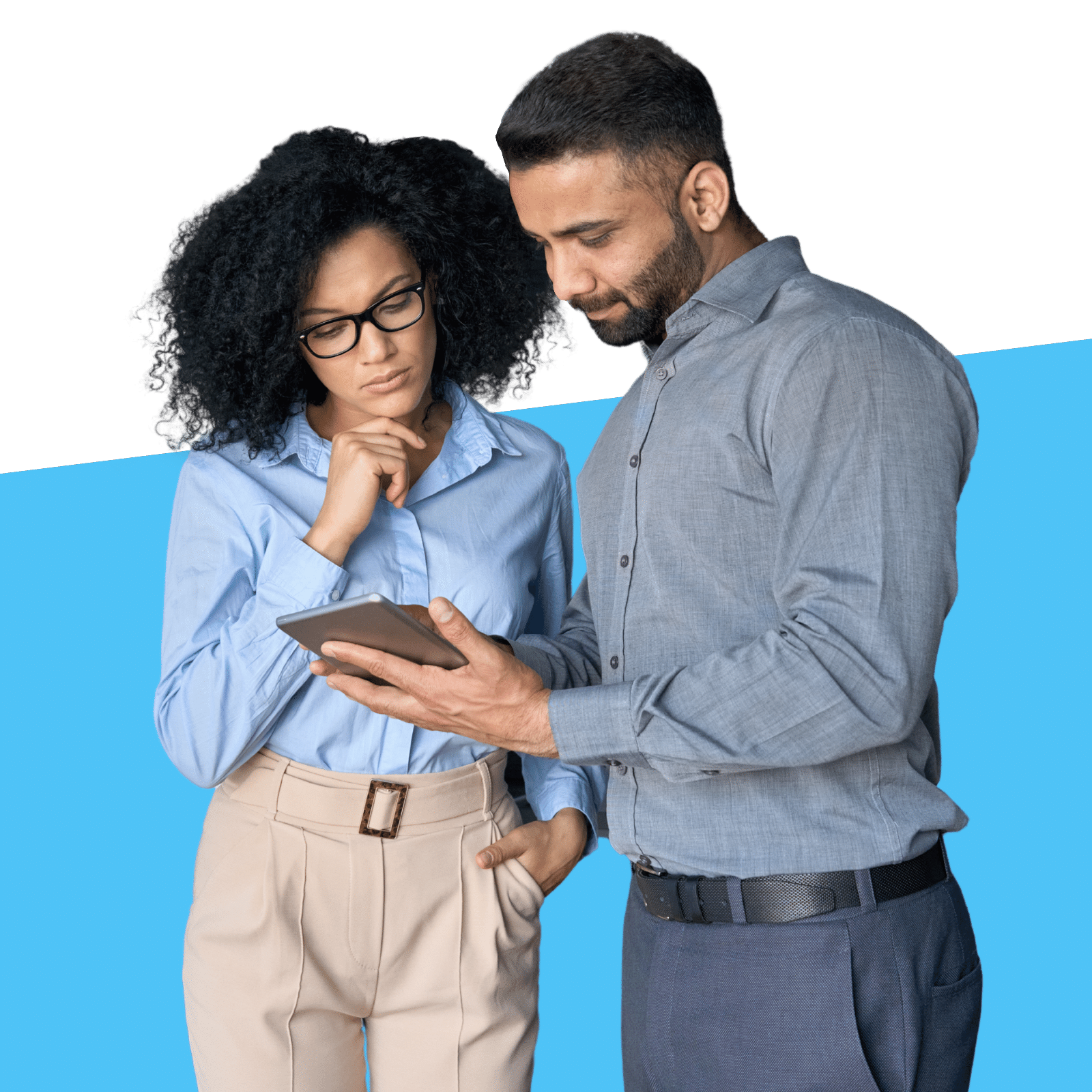 woman with glasses looking at tablet held by man together